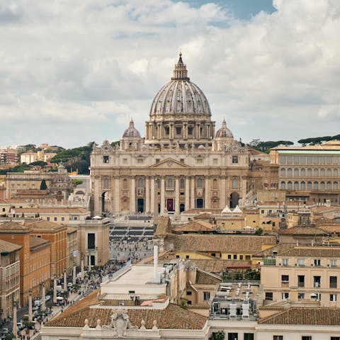 Admire the grandeur of the Vatican's Saint Peter's Basilica, a seven-minute walk away