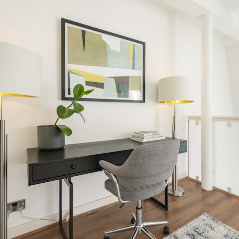Get some work done at the desk on the mezzanine