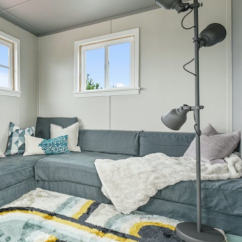 Curl up for movie night in the upstairs den room