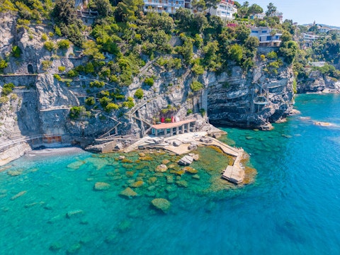 Descend to the waterfront terrace where for a fresh sea dip