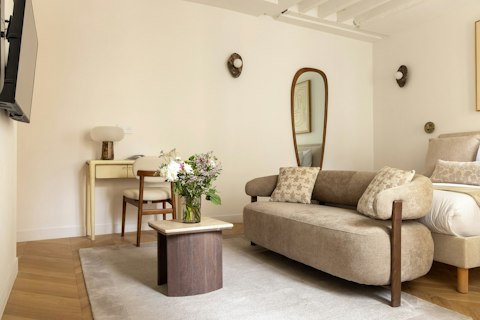 Settle into a serene Le Marais studio with curated neutral decor