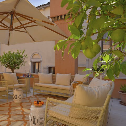 Read up on local history in the shade next to the lime tree