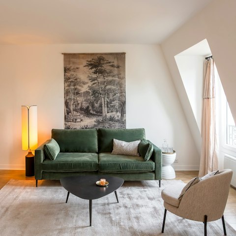 Unwind in the light-filled living area after exploring Paris