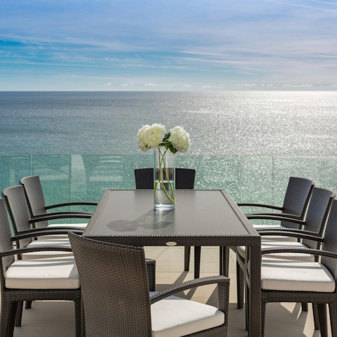Dine on Portuguese dishes as you overlook the glittering Atlantic