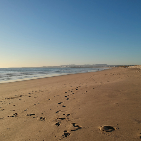 Wake up with a stroll along Salema Beach, right on your doorstep