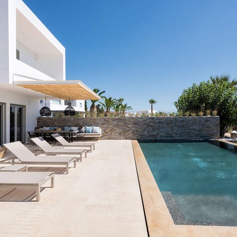 Spend hot afternoons relaxing on a lounger or swimming in the pool