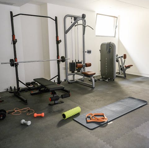 Work up a sweat in the well-equipped in-home gym