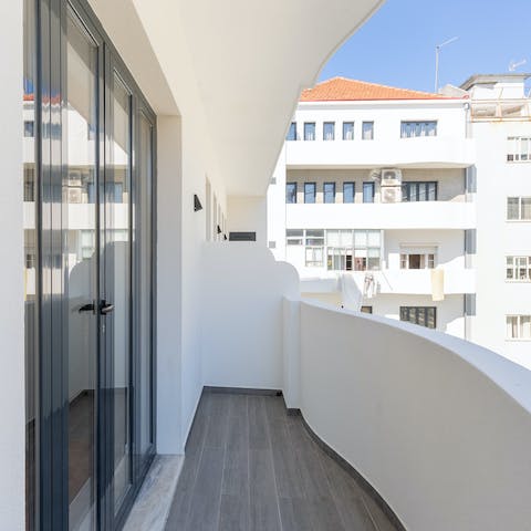 Throw open the glass doors and spend warm evenings gazing out off the balcony