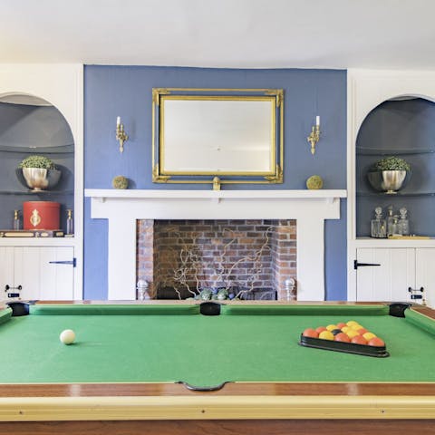 Challenge friends to a game of pool in the evening