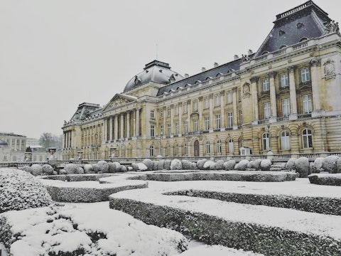 Admire Palais Royal's grand neoclassical façade overlooking Parc de Bruxelles, around fifteen-minutes' walk away