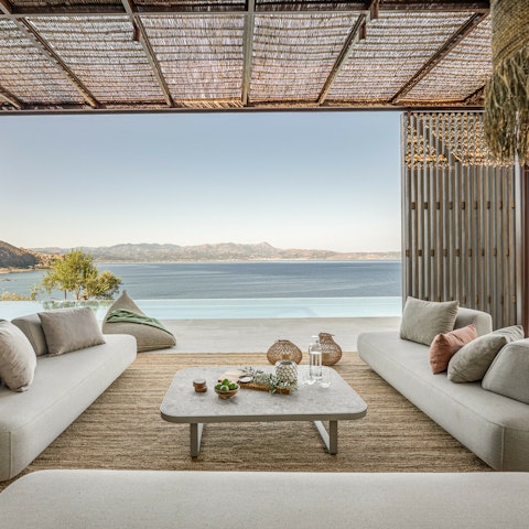 Lounge outside with a cocktail or two and sea views