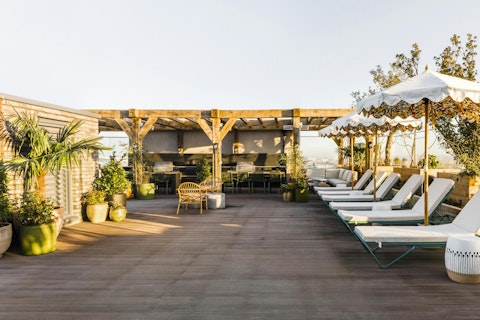 Stretch out on the sun loungers above the London skyline