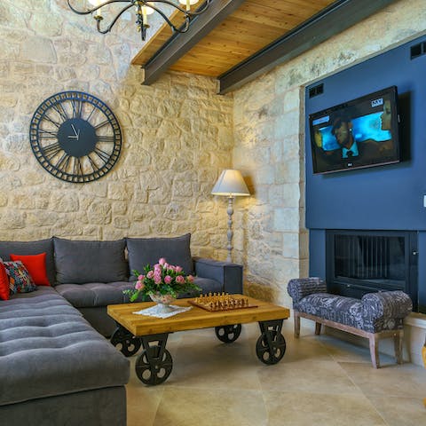 Keep warm on chilly nights by snuggling up in front of the living room fire