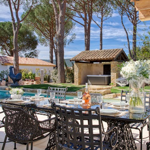 Sit down to rosé, fresh bread, and local cheese