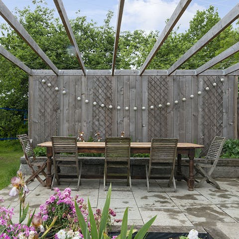 Gather outdoors on sunny evenings for alfresco feasts on the terrace