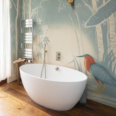 Treat yourself to a soak in the deep free-standing bathtub