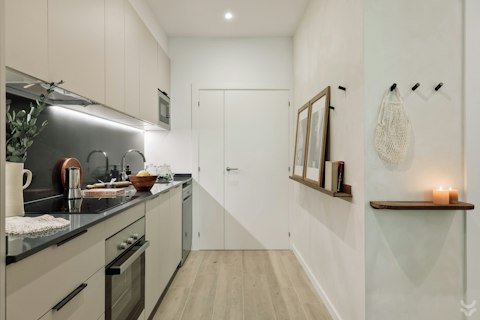 Dish up a delicious paella in the sleek kitchen