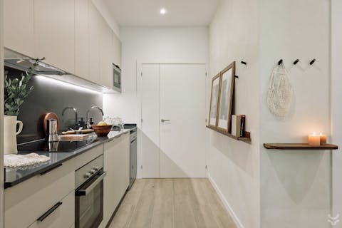Dish up a delicious paella in the sleek kitchen
