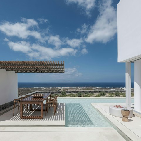 Enjoy incredible views while dining by the pool