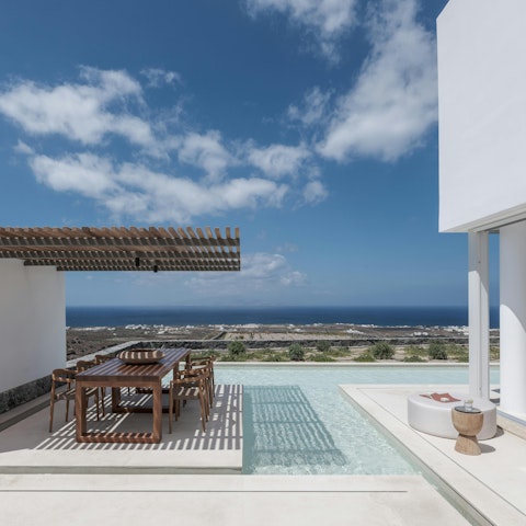 Enjoy incredible views while dining by the pool