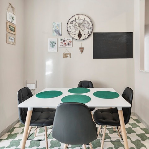 Enjoy relaxed meals in the colourful dining space