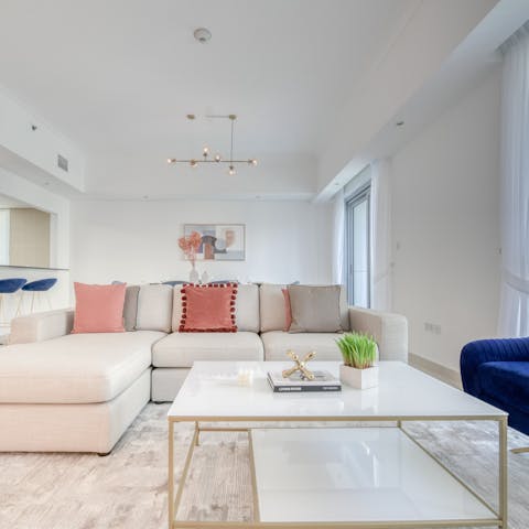 Relax in the stylish living space as you debrief the day