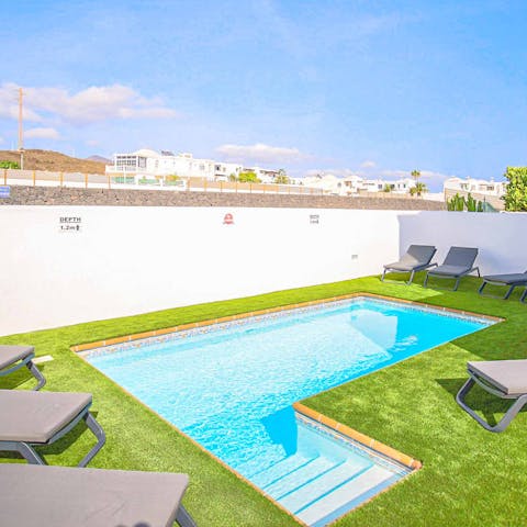 Cool off in the pool after a sunbathing session