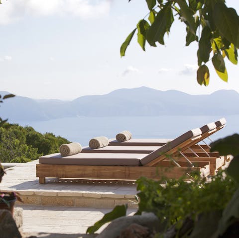 Stretch out on the poolside loungers for a catnap in the sun