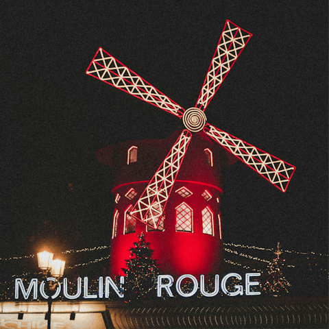Catch a show at the iconic Moulin Rouge – a fifteen-minute walk away
