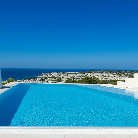 Admire the amazing sea vistas from the infinity pool
