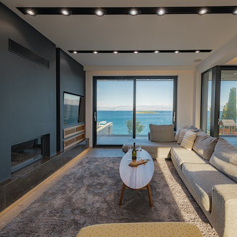 Take the weight off with a glass of wine in the sleek living spaces