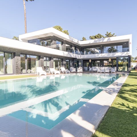 Enjoy an evening dip in the pool as the sun sets