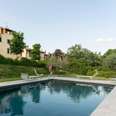 Spend slow mornings reading by the swimming pool
