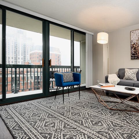 Look out over the city's rooftops from your balcony