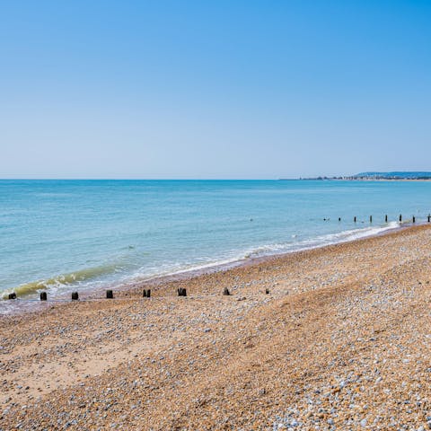 Take a stroll along Pevensey Bay Beach, less than 40 yards from this lovely home