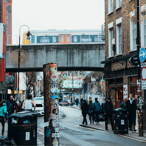 Explore Shoreditch High Street's trendy boutiques and eclectic bars, a ten-minute walk away
