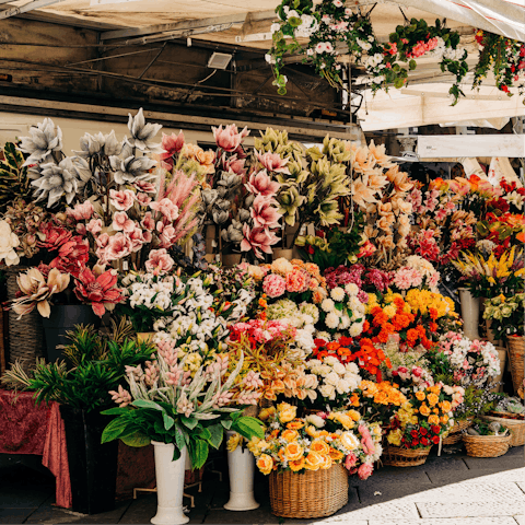 Experience the colourful vibrancy of Columbia Road Flower Market, a four-minute stroll away