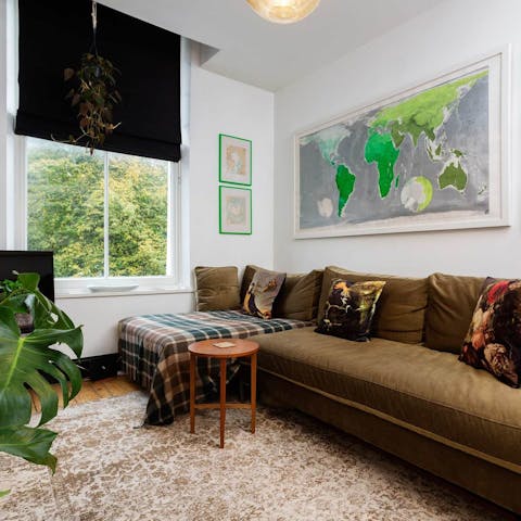Kick back in the calm, bright living room with one of the countless books from the shelves