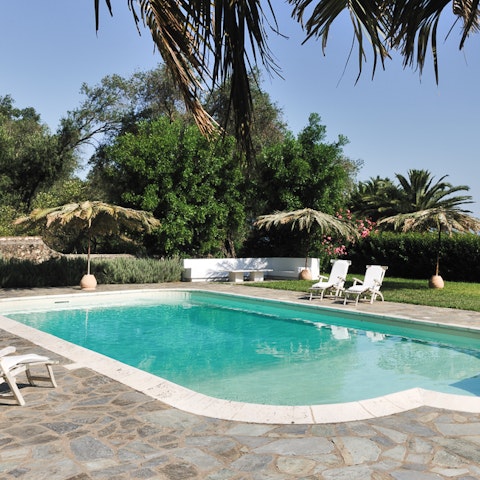 Top up your tan by the outdoor pool