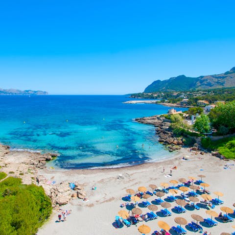 Sprawl out on Platja de San Pere, about 900m away