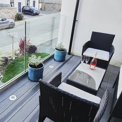 Catch some fresh air on the balcony and enjoy something fizzy