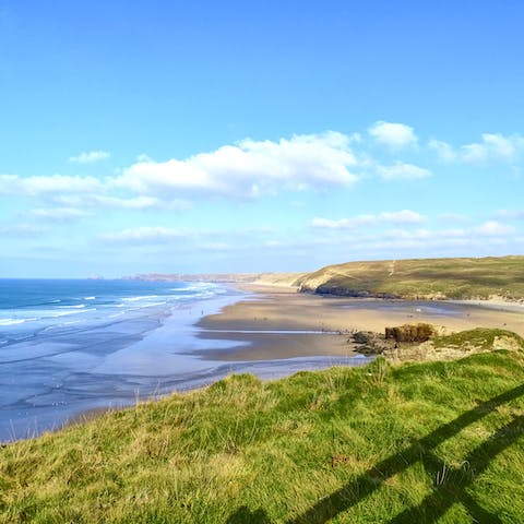 Make the fifteen-minute walk to Perranporth's beautiful sandy beach