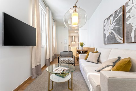 Settle into a cosy space that flows into the kitchen