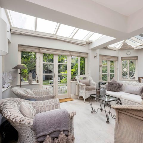 Relax with a good book in one of the light, bright living areas