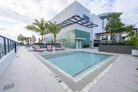 Grab a lounger and relax by the shared pool