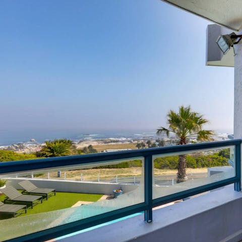 Take in wide-sweeping views from the bedrooms' balconies