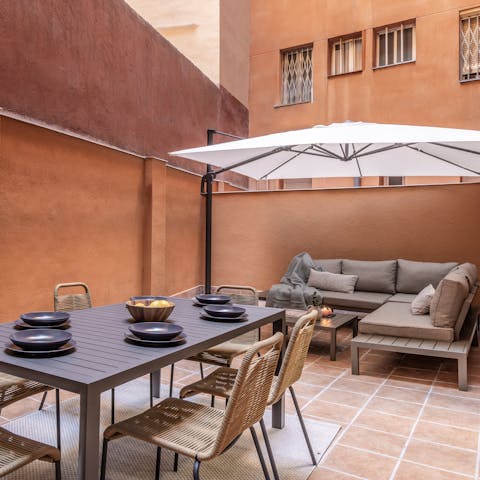 Unwind with a jug of sangria on the private terrace