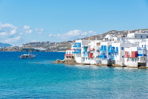 Sip cocktails at on the Mykonos Town waterfront, a short drive away