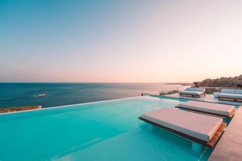 Float at the edge as the Aegean stretches to the horizon