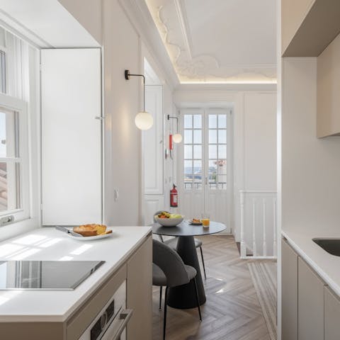 Fire up the coffee machine in the sleek, modern kitchen